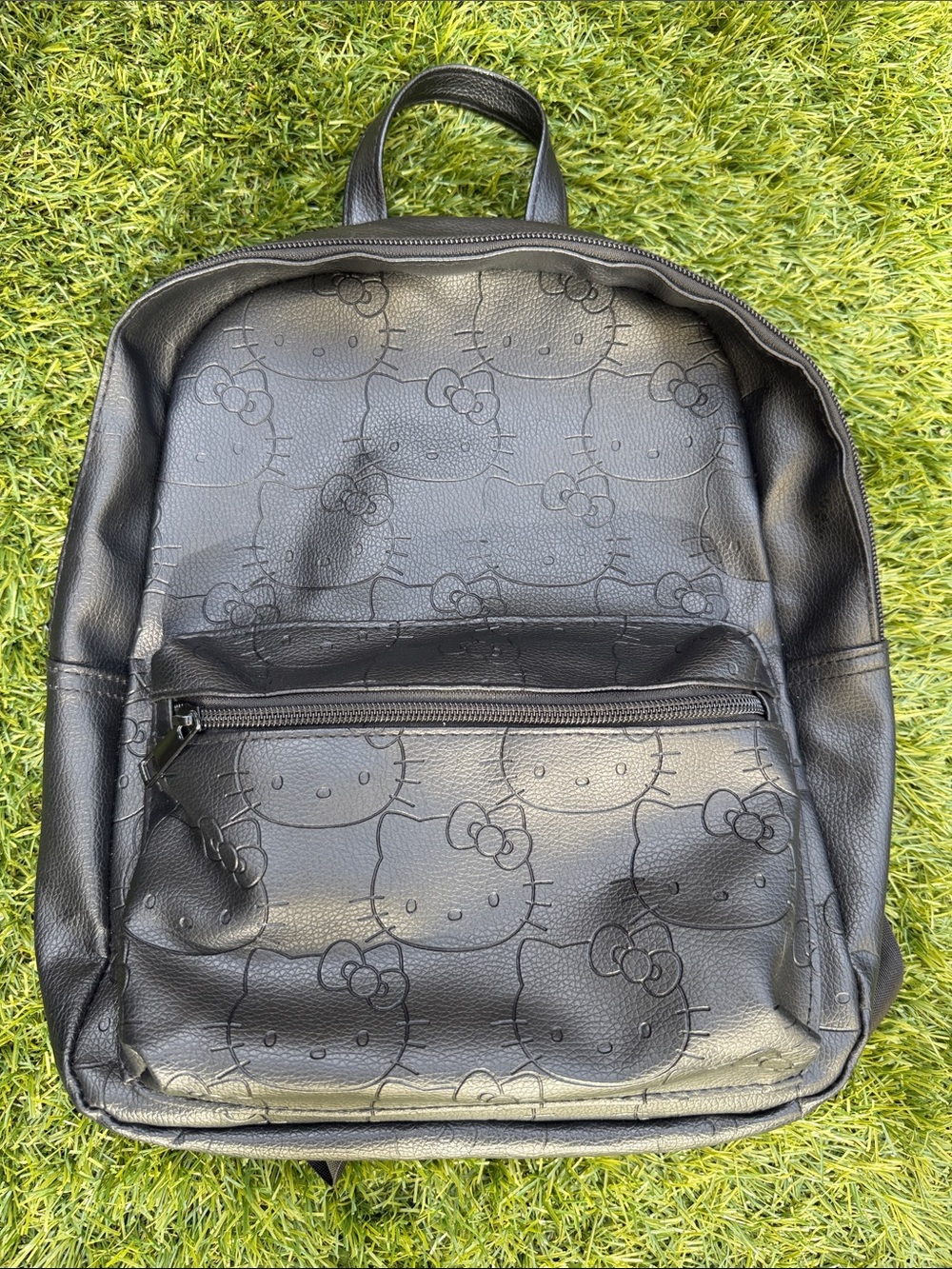Hello Kitty Sanrio Faux leather Black Embossed Backpack All Over Print